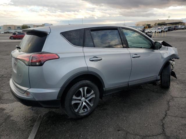 Photo 3 from auction – 2018 TOYOTA RAV4 LE with VIN 2T3ZFREV4JW509181