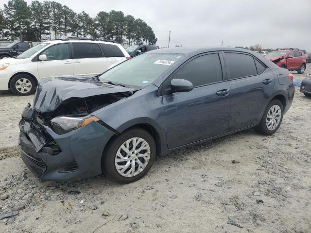 TOYOTA COROLLA L 2018 with VIN 5YFBURHE7JP772374 - Photo from auction