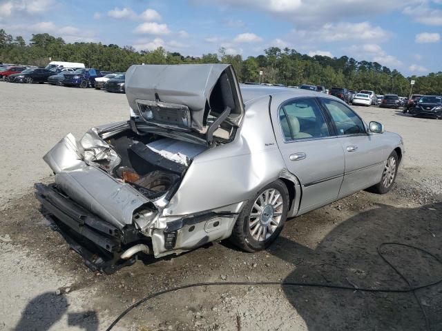 Photo 3 from auction – 2004 LINCOLN TOWN CAR E with VIN 1LNHM81WX4Y633715