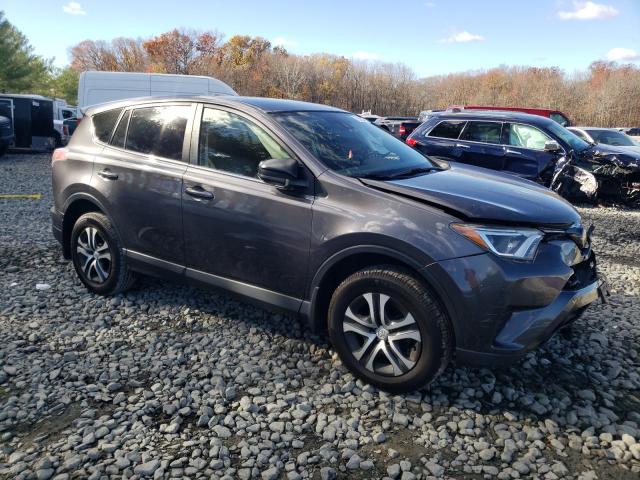 Photo 4 from auction – 2018 TOYOTA RAV4 LE with VIN JTMBFREV9JJ233211