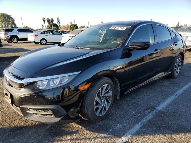 HONDA CIVIC EX 2018 with VIN 2HGFC2F78JH510810 - Photo from auction