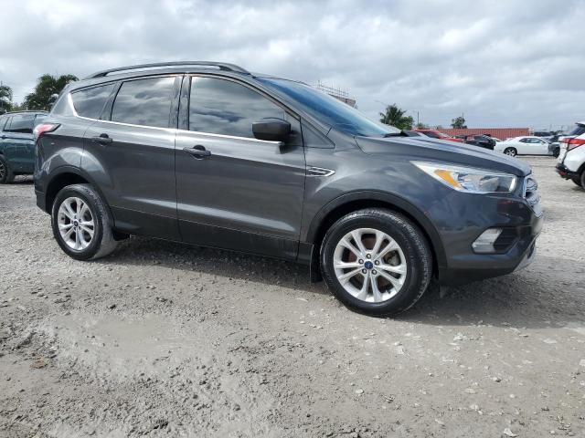 Photo 4 from auction – 2018 FORD ESCAPE SE with VIN 1FMCU9GD1JUB50672