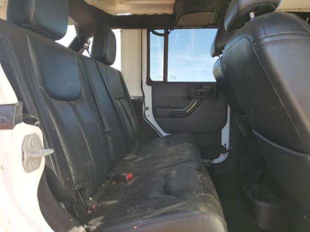 Photo 11 from auction – 2015 JEEP WRANGLER U with VIN 1C4BJWEG5FL699387