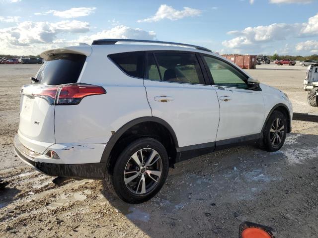 Photo 3 from auction – 2017 TOYOTA RAV4 XLE with VIN 2T3WFREV1HW333042