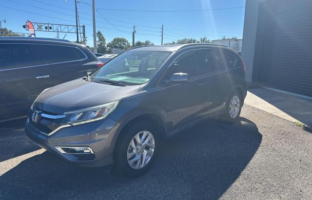 Photo 2 from auction – 2015 HONDA CR-V EXL with VIN 2HKRM3H79FH553336