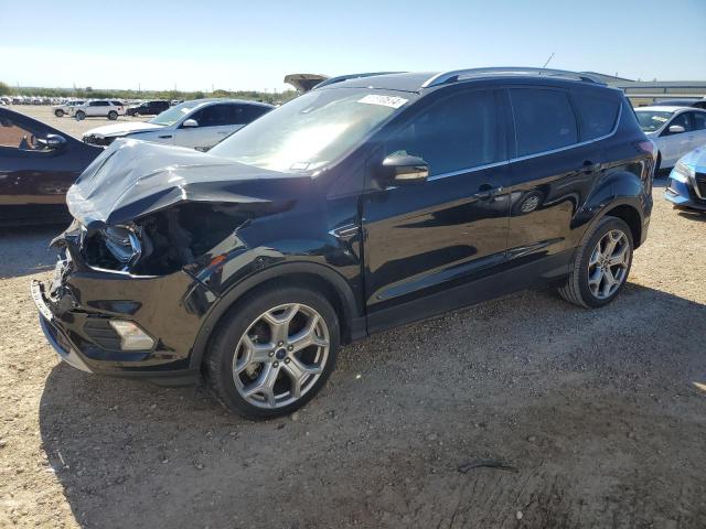 FORD ESCAPE TIT 2017 with VIN 1FMCU0J91HUD84269 - Photo from auction