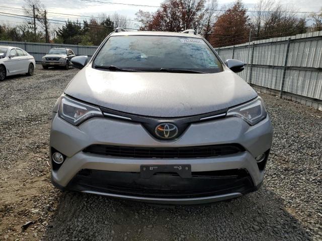 Photo 5 from auction – 2018 TOYOTA RAV4 LIMIT with VIN JTMDFREV7JD231495