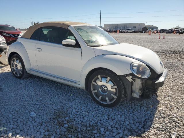 Photo 4 from auction – 2014 VOLKSWAGEN BEETLE with VIN 3VW5X7AT1EM804599