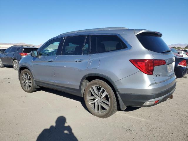 Photo 2 from auction – 2016 HONDA PILOT ELIT with VIN 5FNYF6H0XGB022804