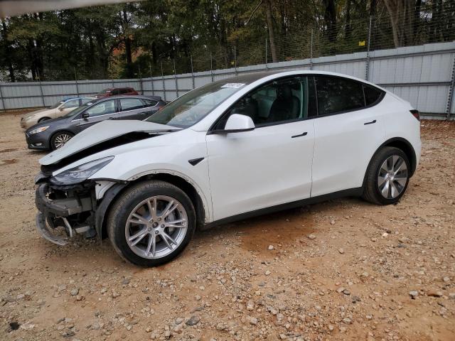 TESLA MODEL Y 2022 with VIN 7SAYGDEE8NF316106 - Photo from auction