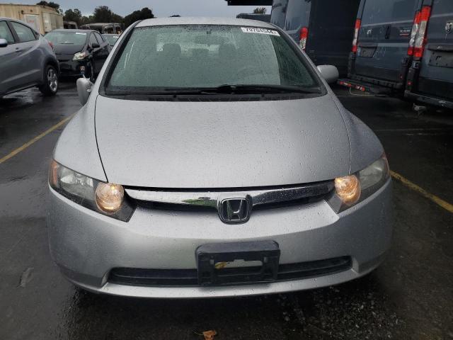 Photo 5 from auction – 2007 HONDA CIVIC LX with VIN JHMFA16547S008972