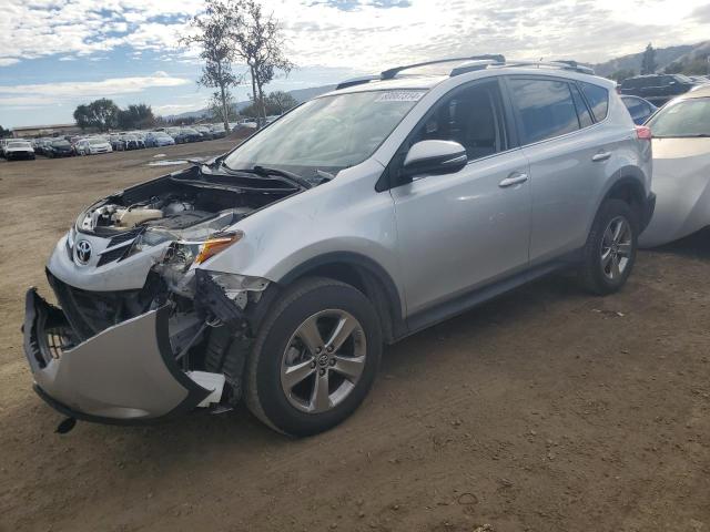 TOYOTA RAV4 XLE 2015 with VIN JTMWFREV4FD056218 - Photo from auction