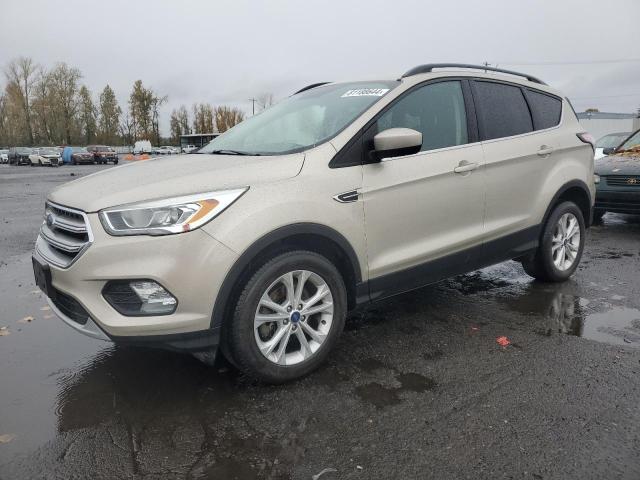 FORD ESCAPE SE 2017 with VIN 1FMCU9GD8HUC81897 - Photo from auction