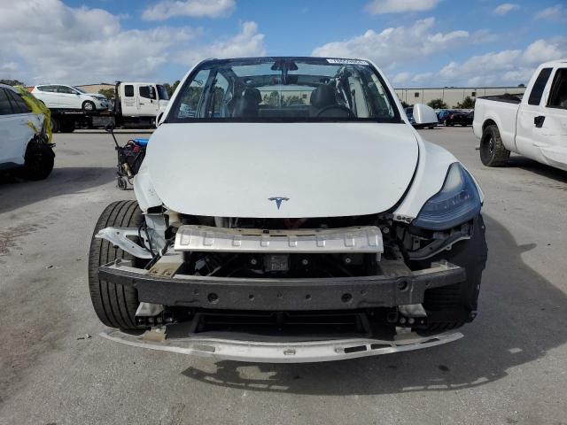 Photo 5 from auction – 2021 TESLA MODEL Y with VIN 5YJYGDED5MF125892