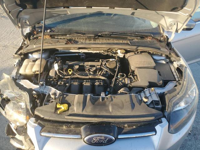 Photo 11 from auction – 2013 FORD FOCUS TITA with VIN 1FADP3J28DL294899