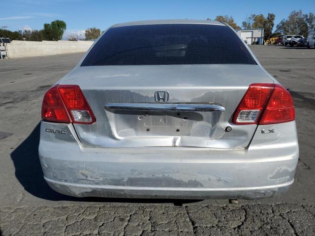 Photo 6 from auction – 2003 HONDA CIVIC LX with VIN 2HGES16563H520911
