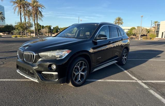 Photo 2 from auction – 2016 BMW X1 XDRIVE2 with VIN WBXHT3C33G5E54263