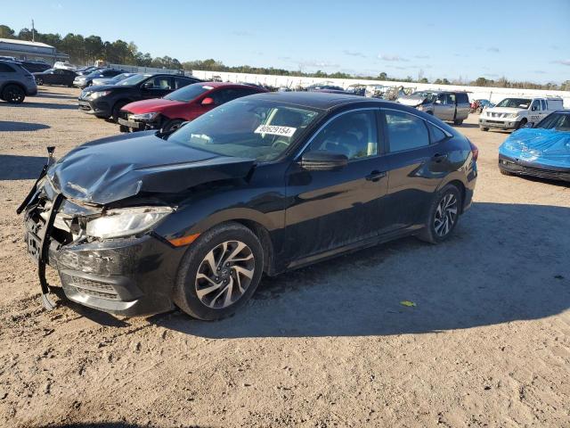HONDA CIVIC EX 2017 with VIN 19XFC2F70HE201112 - Photo from auction