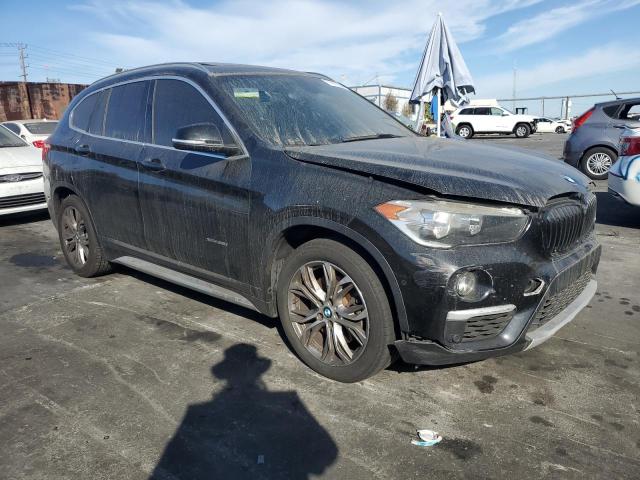 Photo 4 from auction – 2016 BMW X1 XDRIVE2 with VIN WBXHT3C35G5E56709