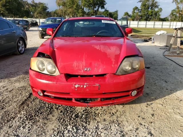 Photo 5 from auction – 2003 HYUNDAI TIBURON with VIN KMHHM65D43U038524