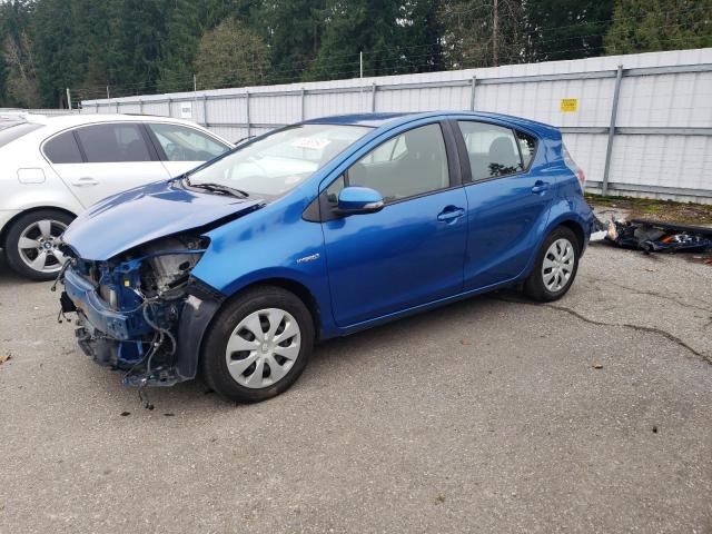 TOYOTA PRIUS C 2014 with VIN JTDKDTB33E1074911 - Photo from auction