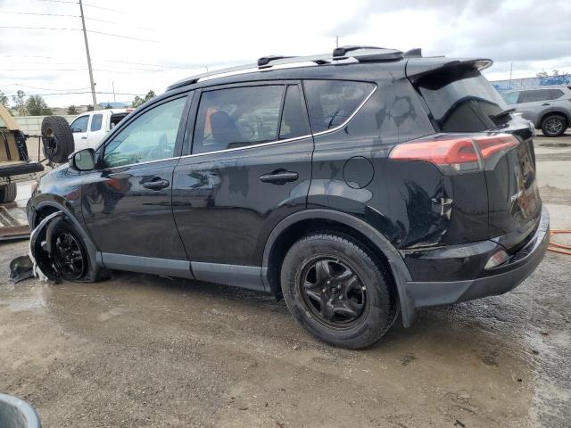 Photo 2 from auction – 2018 TOYOTA RAV4 LE with VIN 2T3BFREV0JW819412
