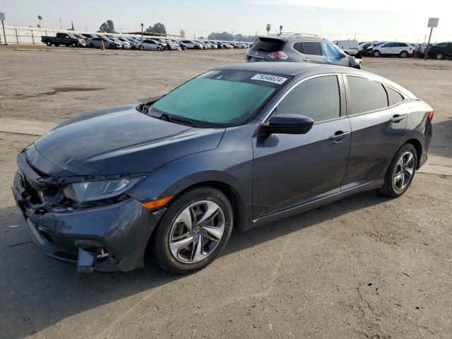 HONDA CIVIC LX 2019 with VIN 19XFC2F67KE213935 - Photo from auction