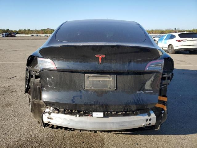 Photo 6 from auction – 2022 TESLA MODEL Y with VIN 7SAYGDEE2NF342216