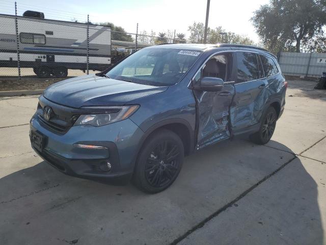 HONDA PILOT SE 2021 with VIN 5FNYF5H27MB038787 - Photo from auction
