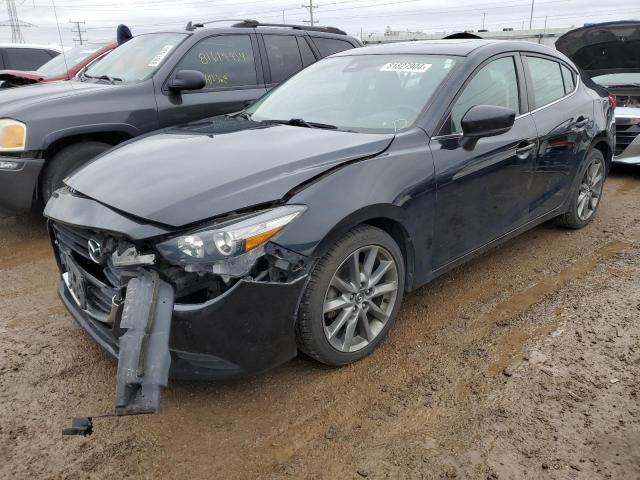 MAZDA 3 TOURING 2018 with VIN 3MZBN1V34JM259881 - Photo from auction