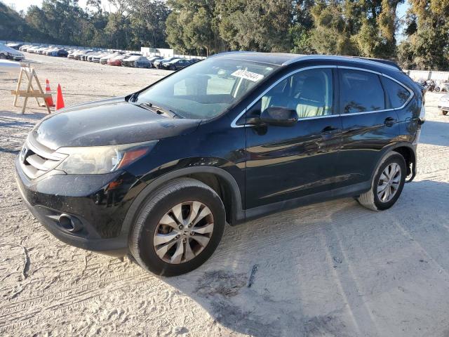 HONDA CR-V EXL 2014 with VIN 2HKRM4H75EH709778 - Photo from auction
