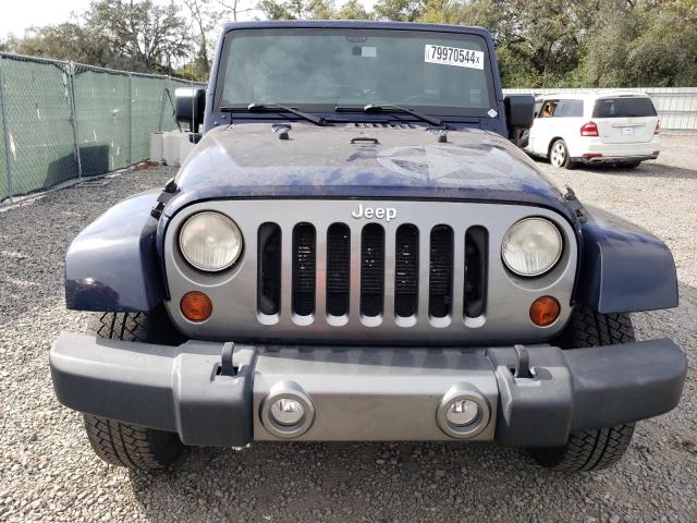 Photo 5 from auction – 2012 JEEP WRANGLER U with VIN 1C4BJWDG4CL290049