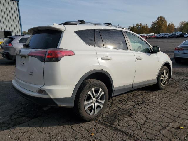 Photo 3 from auction – 2017 TOYOTA RAV4 LE with VIN JTMBFREV7HJ135952