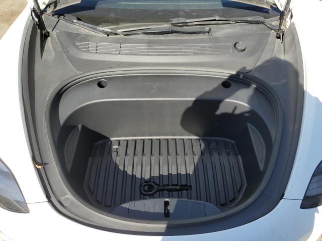 Photo 11 from auction – 2022 TESLA MODEL 3 with VIN 5YJ3E1EB3NF145007