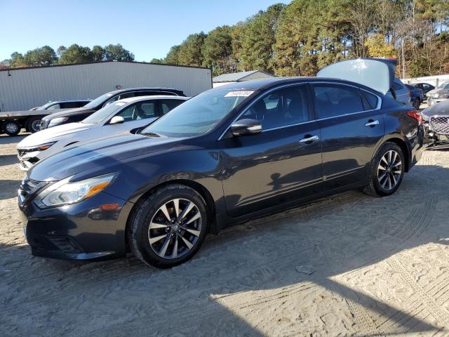 NISSAN ALTIMA 2.5 2016 with VIN 1N4AL3AP7GC128016 - Photo from auction