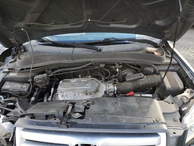 Photo 12 from auction – 2006 HONDA PILOT LX with VIN 2HKYF18106H520151