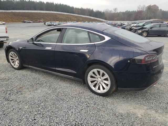Photo 2 from auction – 2014 TESLA MODEL S with VIN 5YJSA1H14EFP54942