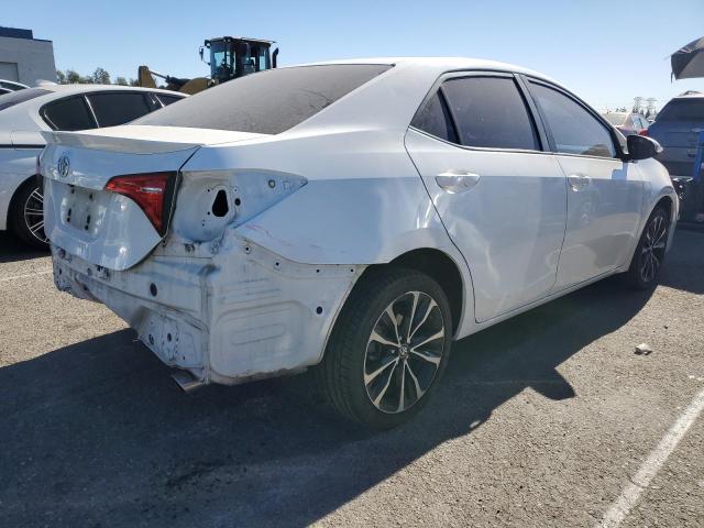 Photo 3 from auction – 2017 TOYOTA COROLLA L with VIN 5YFBURHE4HP577004