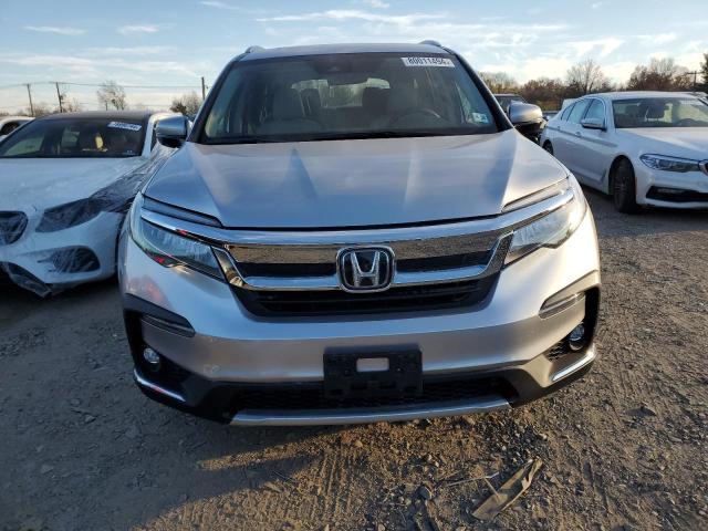 Photo 5 from auction – 2022 HONDA PILOT TOUR with VIN 5FNYF6H91NB010147