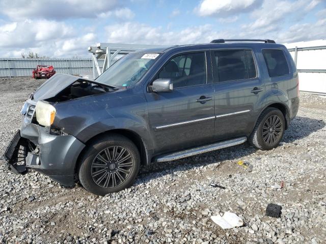 HONDA PILOT TOUR 2013 with VIN 5FNYF3H9XDB001119 - Photo from auction