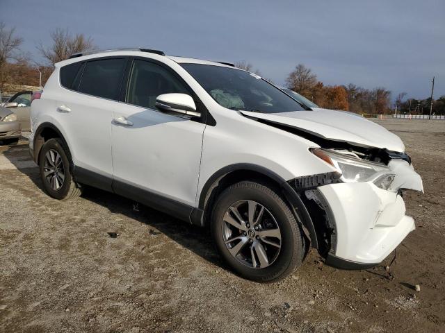 Photo 4 from auction – 2016 TOYOTA RAV4 XLE with VIN JTMRFREV0GJ067751