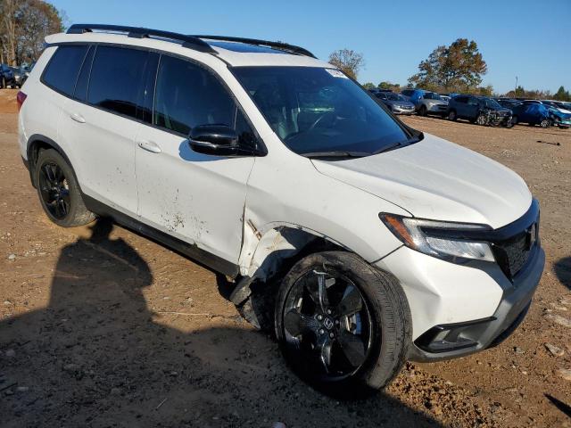 Photo 4 from auction – 2020 HONDA PASSPORT E with VIN 5FNYF8H0XLB011159