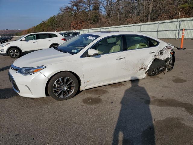 TOYOTA AVALON XLE 2016 with VIN 4T1BK1EB5GU233311 - Photo from auction