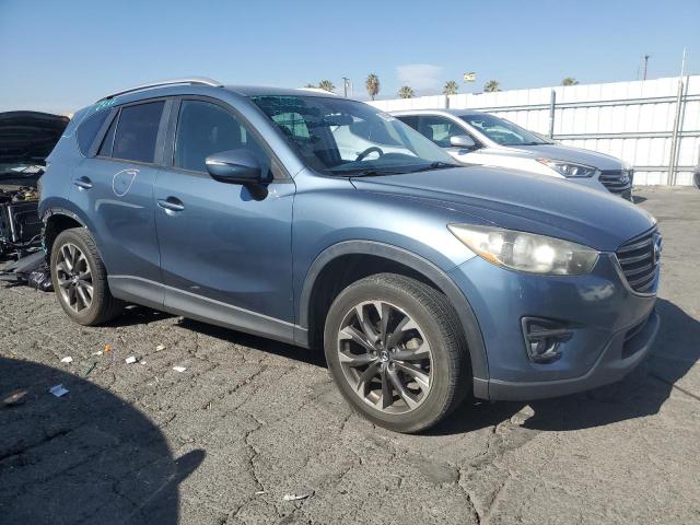 Photo 4 from auction – 2016 MAZDA CX-5 GT with VIN JM3KE2DY2G0763175