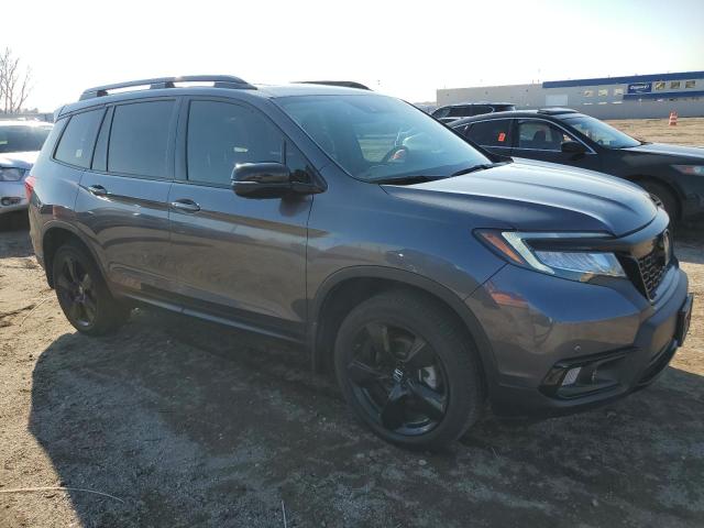 Photo 4 from auction – 2021 HONDA PASSPORT E with VIN 5FNYF8H07MB009113