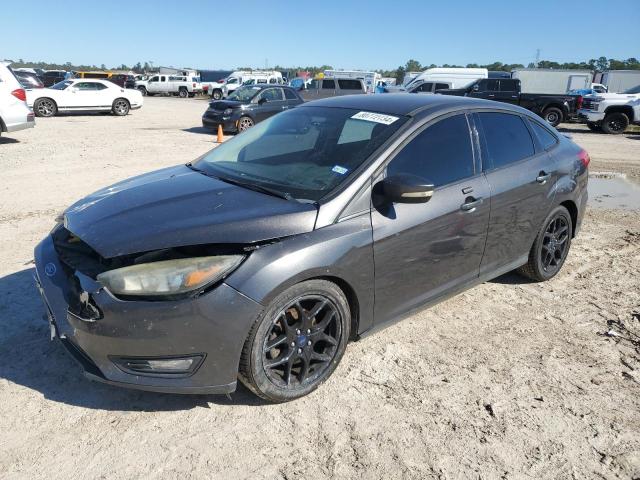 FORD FOCUS SE 2015 with VIN 1FADP3F24FL323746 - Photo from auction