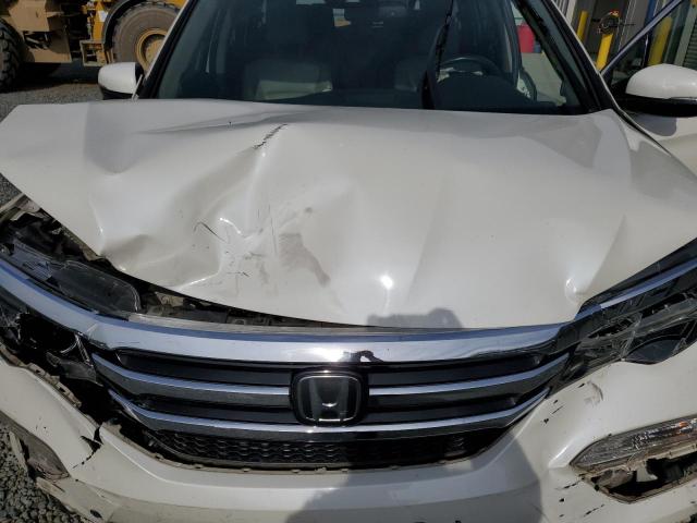 Photo 12 from auction – 2017 HONDA PILOT TOUR with VIN 5FNYF5H9XHB034249