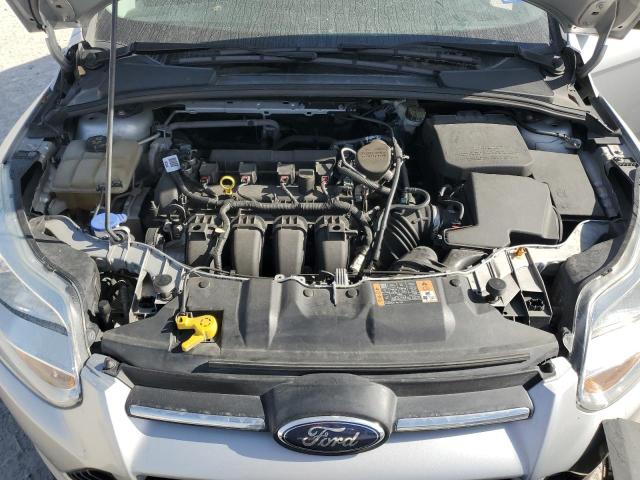Photo 11 from auction – 2014 FORD FOCUS SE with VIN 1FADP3F22EL406140