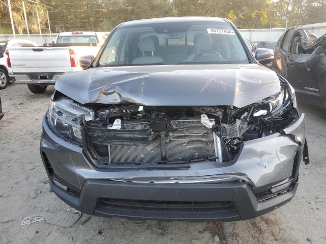 Photo 5 from auction – 2023 HONDA RIDGELINE with VIN 5FPYK3F54PB047391