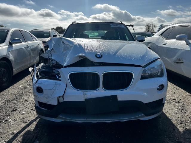Photo 5 from auction – 2015 BMW X1 SDRIVE2 with VIN WBAVM1C55FVZ94063